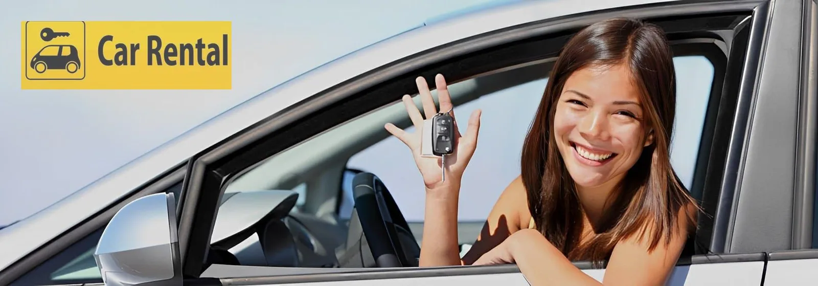 Modern rental car keys on a countertop